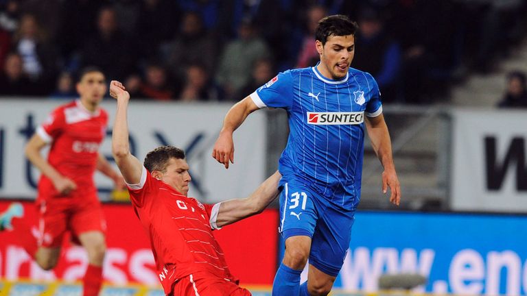 Oliver Fink tries to stop Kevin Volland.