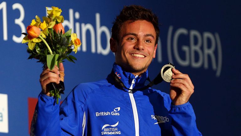 Tom Daley celebrates his victory in Edinburgh