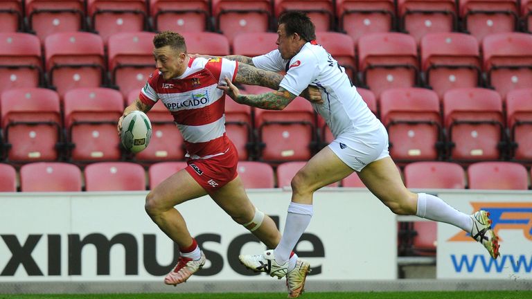 Josh Charnley charges over for a Wigan try