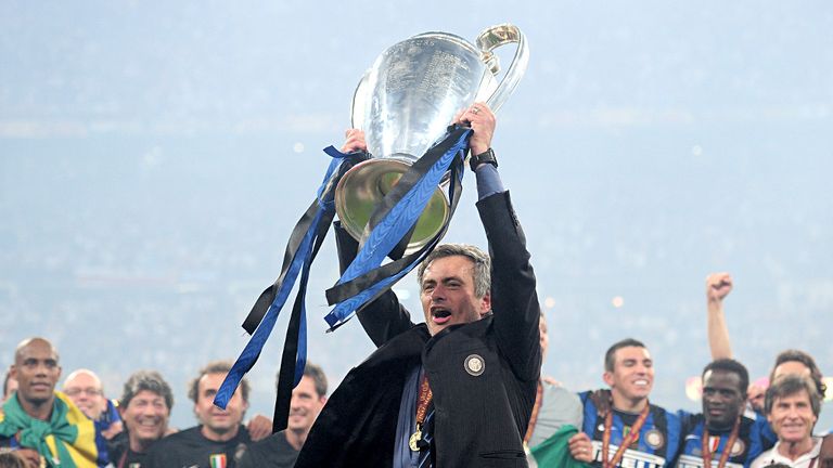 Mourinho lifts the Champions League trophy after Inter's 2-0 success over Bayern Munich in 2010