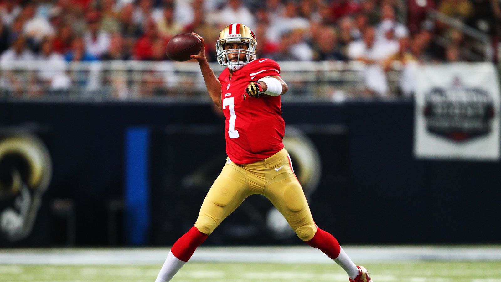 San Francisco 49ers quarterback Colin Kaepernick (7) walks off the field  after the second half of a divisional playoff NFL football game against the  Carolina Panthers, Sunday, Jan. 12, 2014, in Charlotte