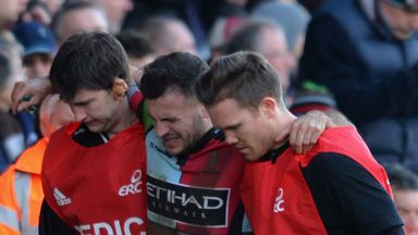 Danny Care: Harlequins scrum-half is helped from the field