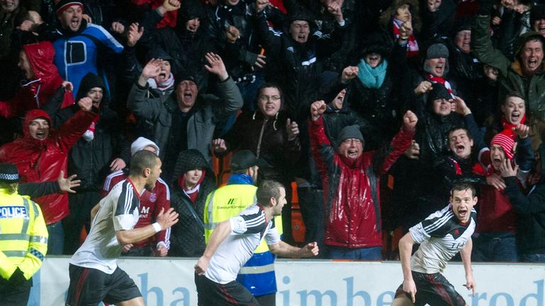 Peter Pawlett celebrates his last-gasp winner at Tannadice