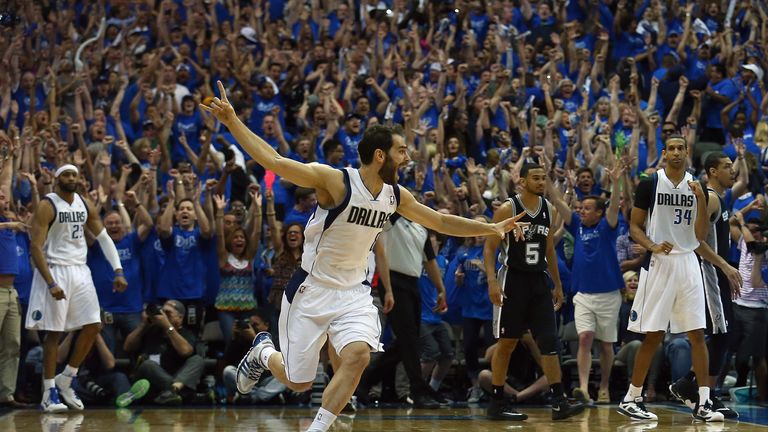 Jose Calderon of the Dallas Mavericks celebrates after Vince Carter's game-winning shot