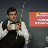 Ronnie O'Sullivan: Defending world champion enjoys a warm drink during first session of his semi-final