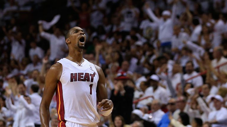 Chris Bosh celebrates scoring for the Miami Heat