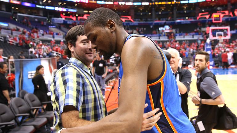 Kevin Durant is congratulated by Masters champion Bubba Watson