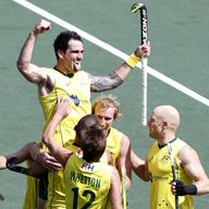 Kieran Govers (top) celebrates after putting Australia 2-1 ahead