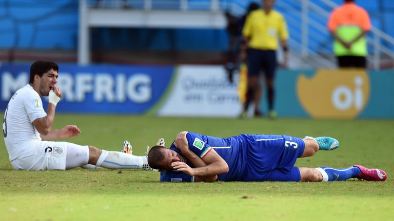 Uruguay's forward Luis Suarez following the incident with Italy defender Giorgio Chiellini