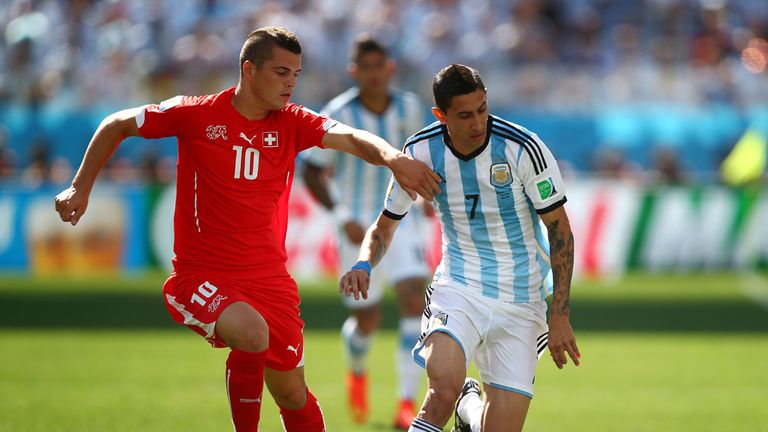Xhaka in action at the World Cup against Argentina's Angel Di Maria
