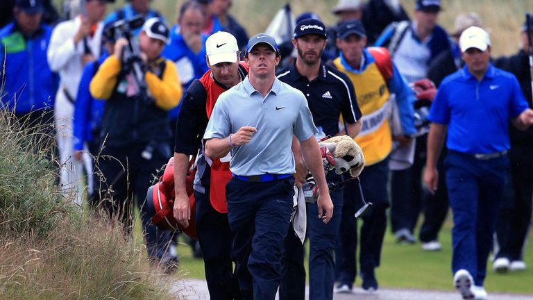 Rory McIlroy strides out on his way to a six-shot lead