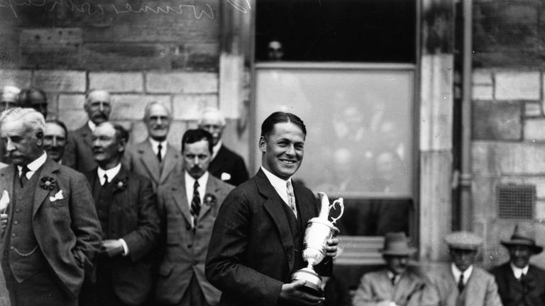 American golfer Bobby Jones (1902 - 1971) holding the Claret Jug