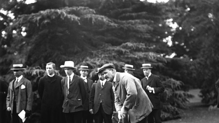 John Henry Taylor practicing his putting