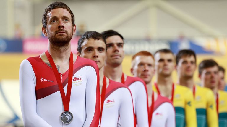 Sir Bradley Wiggins on the Commonwealth podium after receiving a silver medal in the mens 400m Team Pursuit