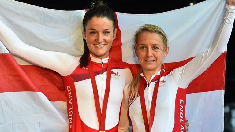 Lizzie Armitstead (L) and Emma Pooley (R) celebrate their gold and silver medal rides in the women's road race at the 2014 Commonwealth Games
