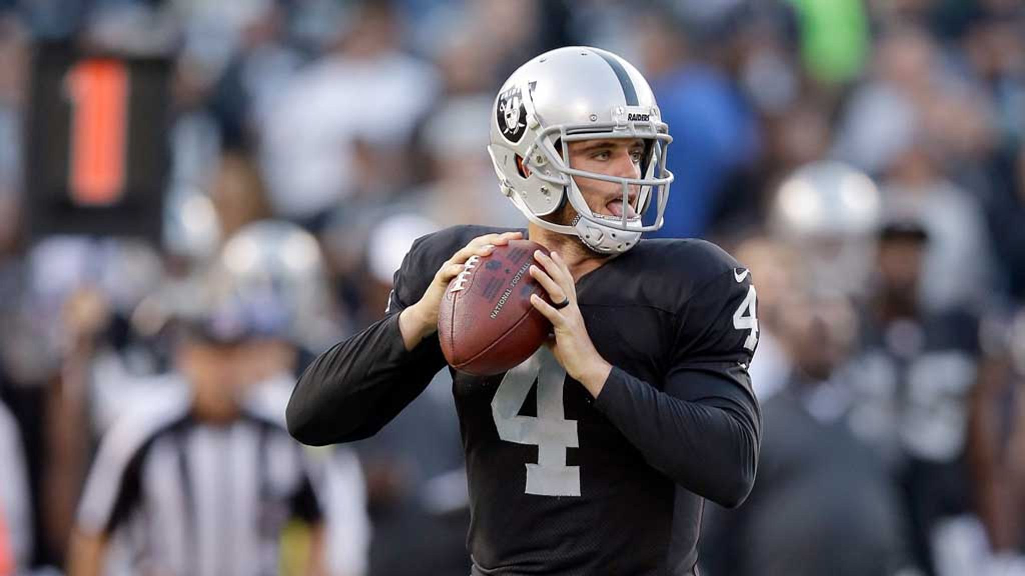 Raiders' Derek Carr injured in 38-14 loss to Dolphins (w/video)