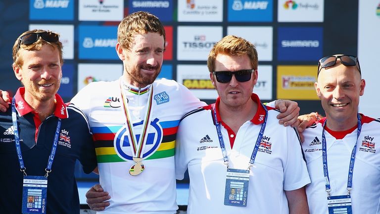 Sir Bradley Wiggins celebrates with from left, Tim Kerrison, Rod Ellingworth and Sir Dave Brailsford