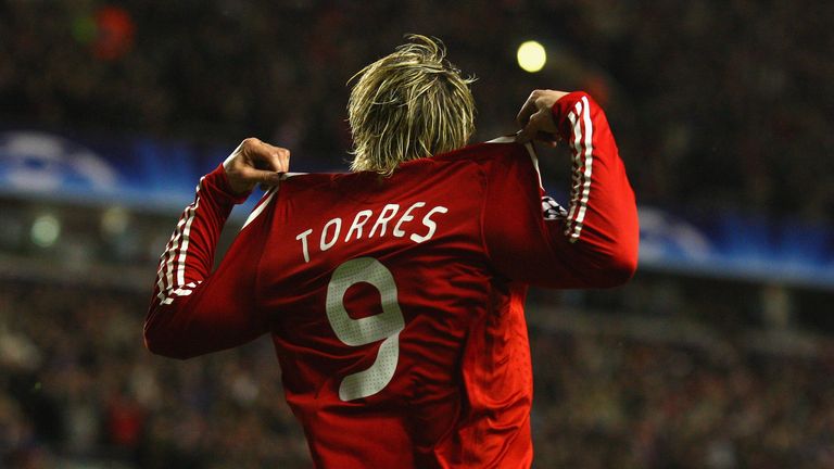 Fernando Torres celebrates opening the scoring against Real