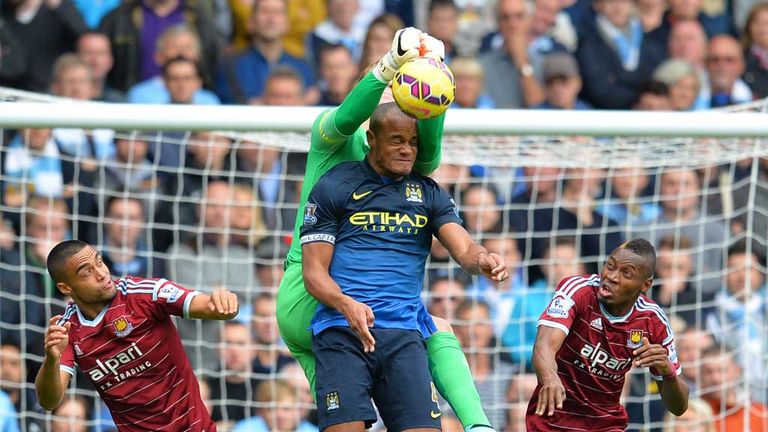 Joe Hart and Vincent Kompany clash