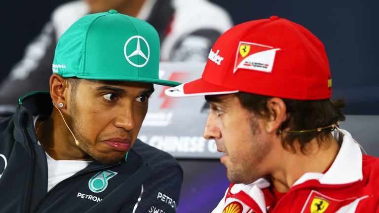 Lewis Hamilton of Great Britain and Mercedes GP speaks with Fernando Alonso of Spain and Ferrari during a press conference, China GP, April 2014