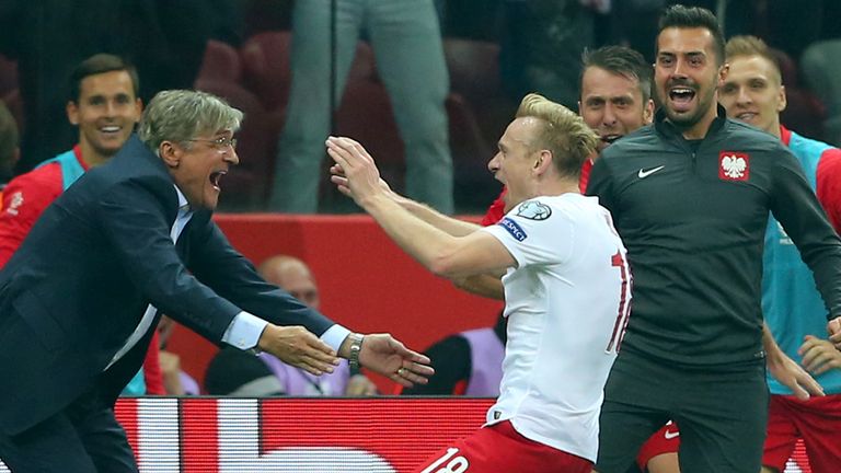 Sebastian Mila (C): Celebrates scoring Poland's second goal