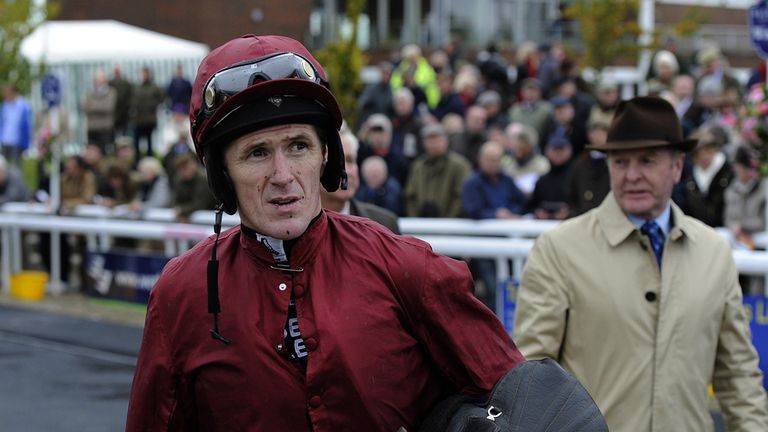 Tony McCoy shows his discomfort after dismounting Goodwood Mirage