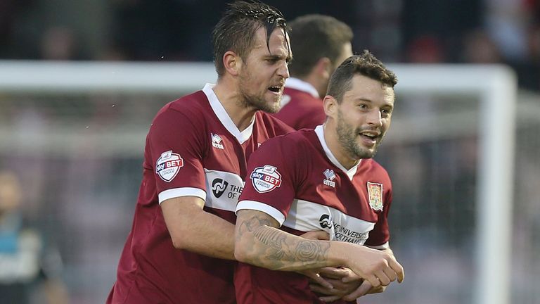 Darren Carter celebrates with Marc Richards