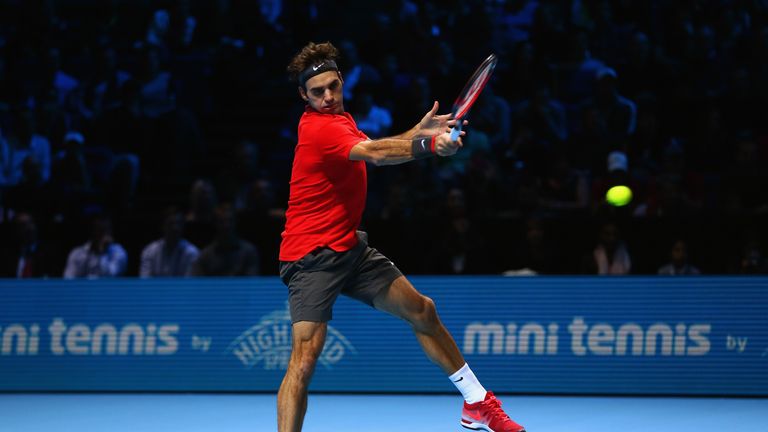 Federer hits a forehand in his win over Stan Wawrinka