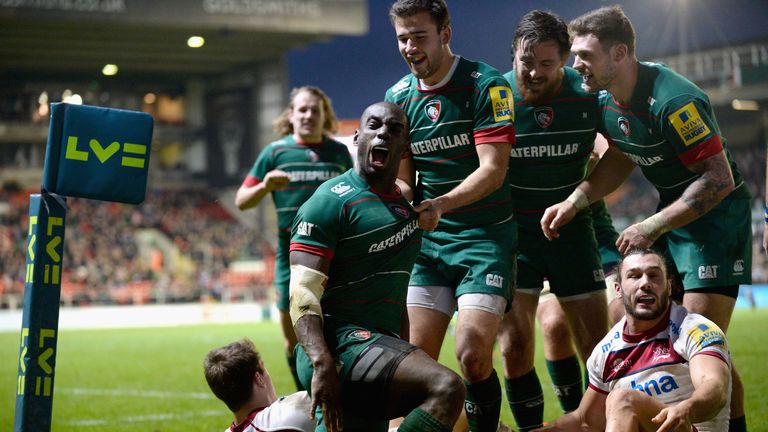 Miles Benjamin celebrates after scoring a try
