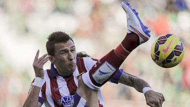 Atletico Madrid's Mario Mandzukic tries to control a high ball