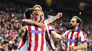 Fernando Torres bagged a brace as Atletico Madrid knocked out local rivals Real