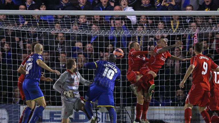 Adebayo Akinfenwa sets up to turn the ball home from three yards for 1-1