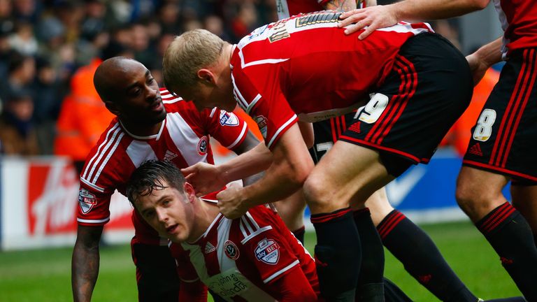 McNulty: Mobbed by team-mates
