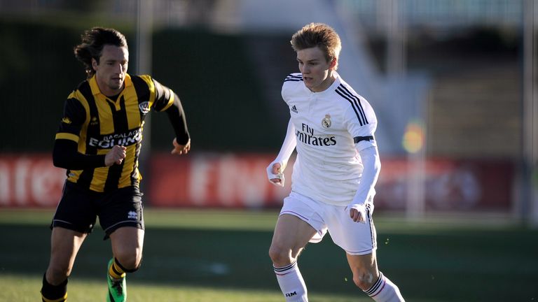 Odegaard (right) has made just one senior appearance at Real Madrid, and that was under Carlo Ancelotti