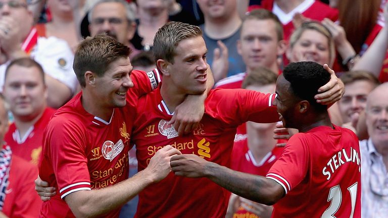 Steven Gerrard, Jordan Henderson and Raheem Sterling celebrate
