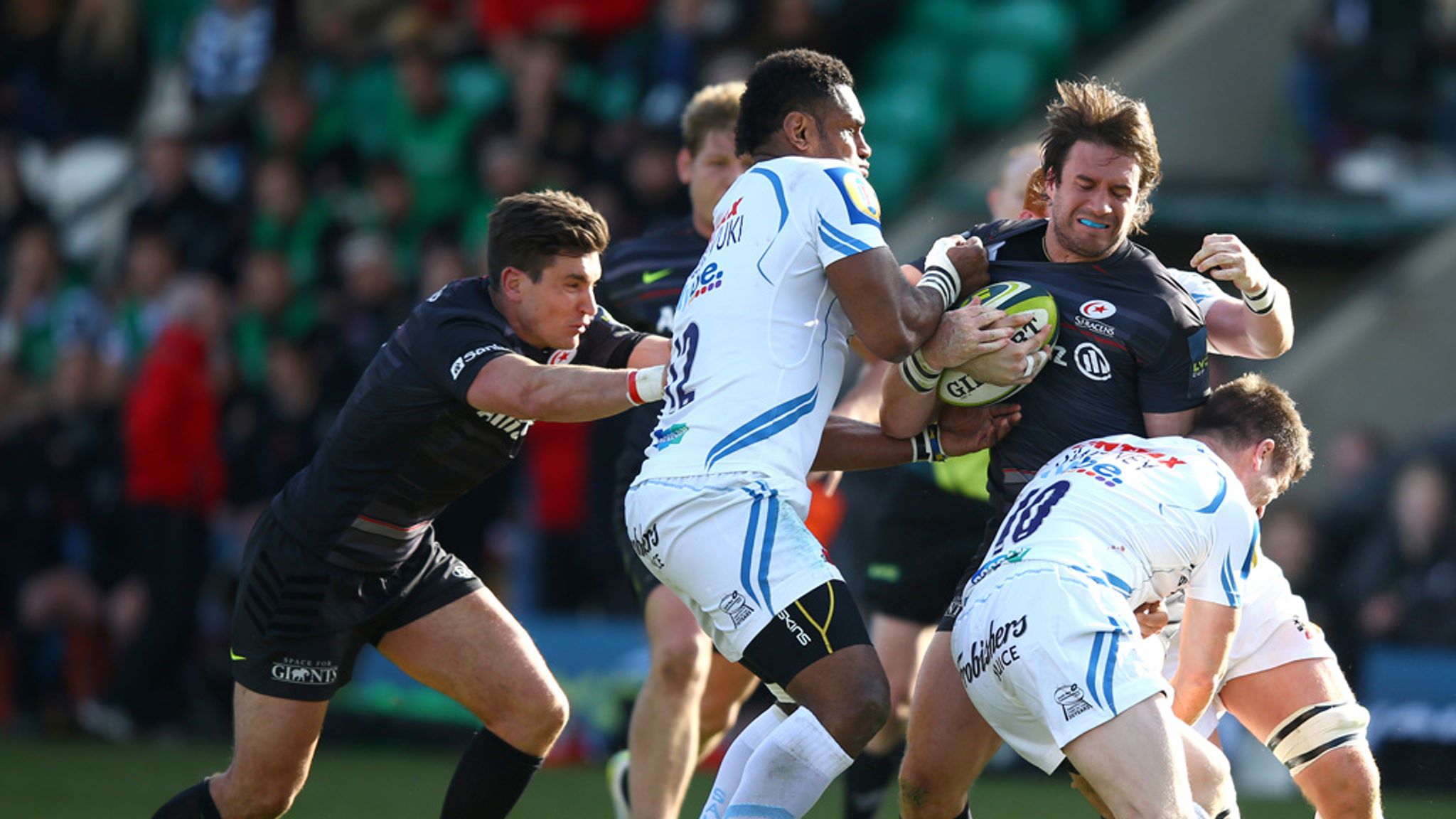 Leicester Tigers' Alesana Tuilagi is tackled by London Wasps' Alex