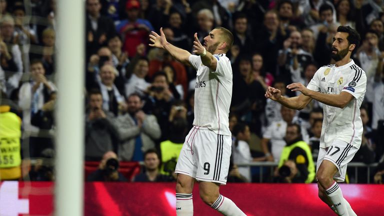 Karim Benzema celebrates on an edgy night for Real