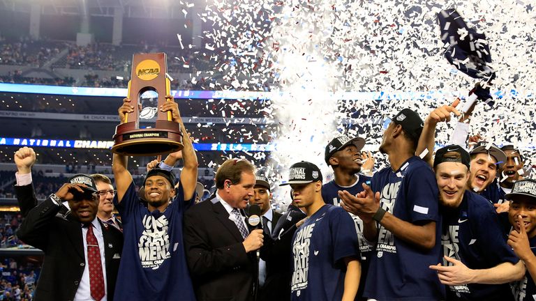 Connecticut Huskies celebrate victory in last year's final