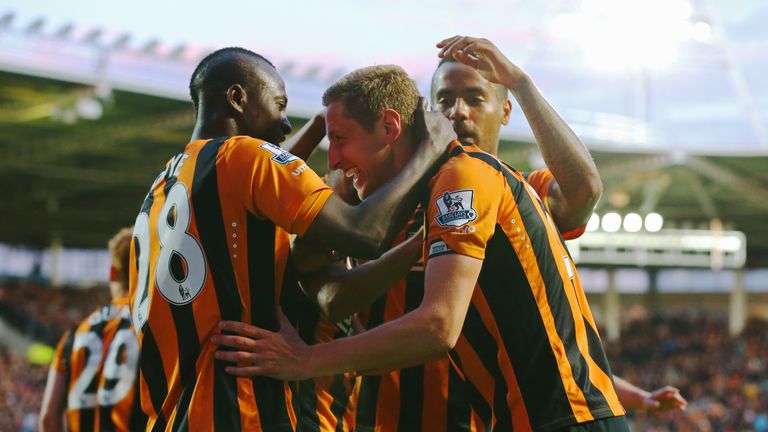 Michael Dawson: mobbed after scoring for Hull