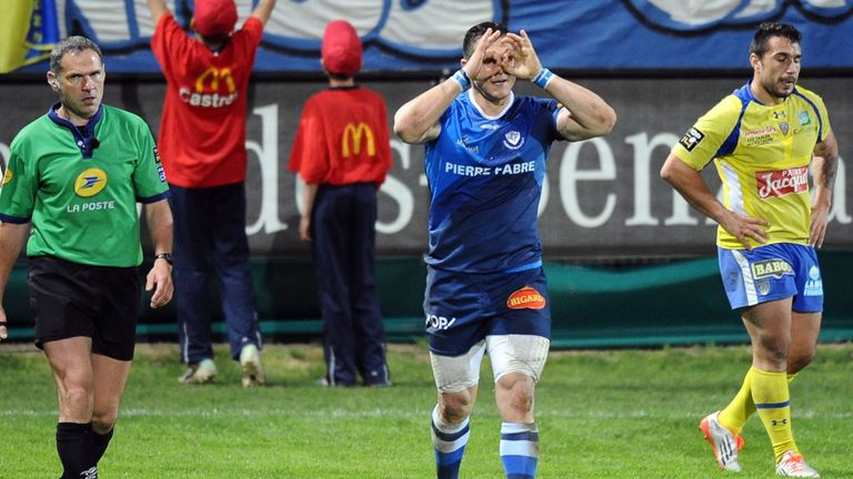 Castres winger Remy Grosso celebrates after scoring one of his three tries against Clermont