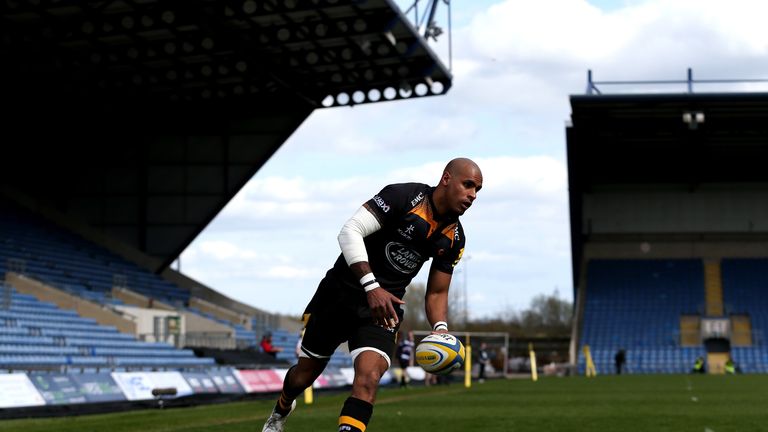 Wasps wing Tom Varndell crosses for one of his three tries at the Kassam Stadium