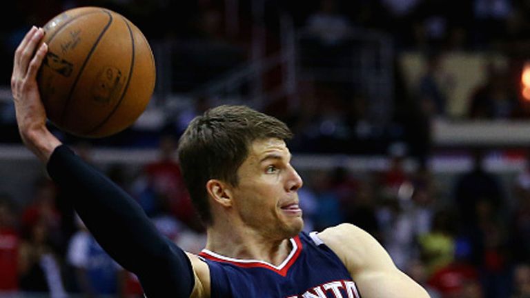 Atlanta Hawks' Kyle Korver saves a ball from going out of bounds