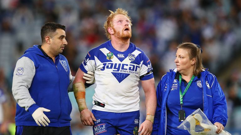 James Graham of the Canterbury Bulldogs leaves the field after being knocked out against Sydney Roosters
