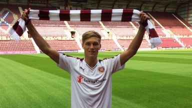 Image of Gavin Reilly: Shows off Hearts' away kit after completing move to Tynecastle from Queen of the South