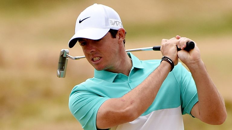 Rory McIlroy reacts to another missed putt during the first round