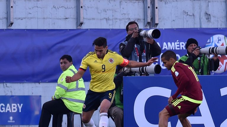 Radamel Falcao (left) vies for the ball with Venezuelan Ronald Vargas