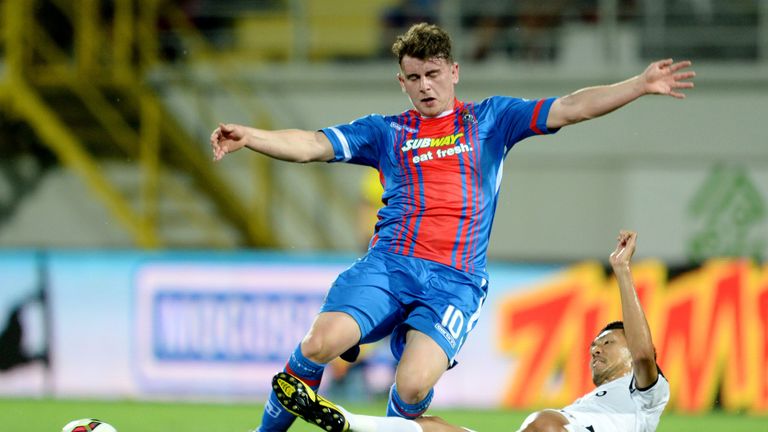 Astra's Takayuki Seto (right) challenges Inverness Caledonian Thistle's Aaron Doran (left) in their Europa league tie