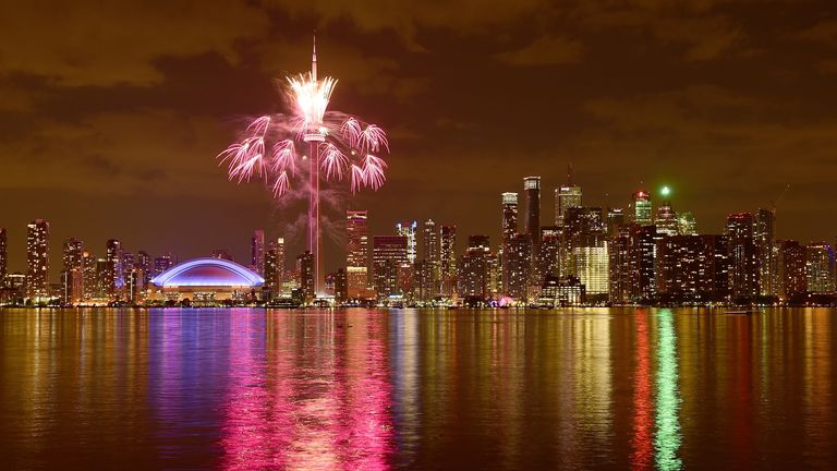 Fireworks over the Toronto skyline during opening ceremony of the 2015 Pan Am Games, in which the city has invested heavily