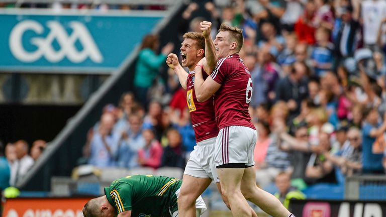 John Heslin is congratulated by Kieran Martin after scoring Westmeath's third goal against Meath