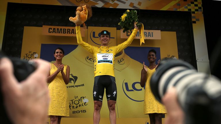 Tony Martin takes the yellow jersey after winning stage four of the Tour de France